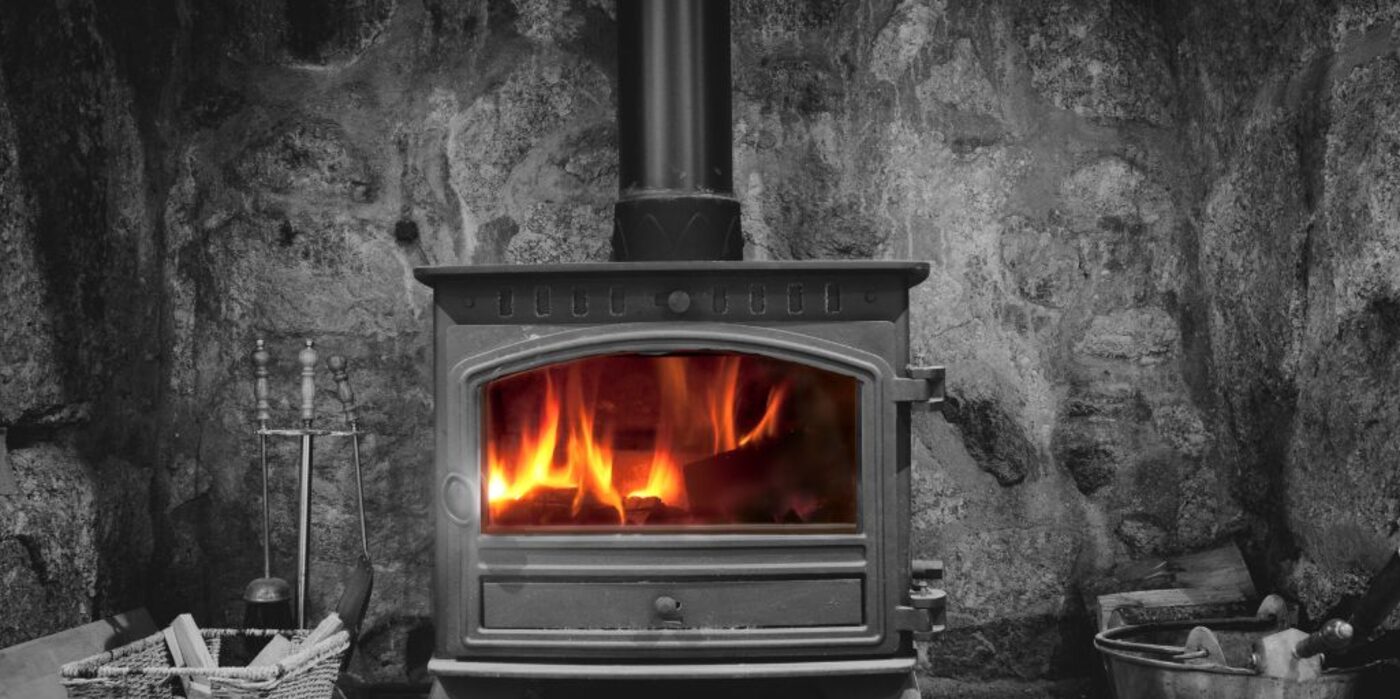 Wood fire by the stone wall